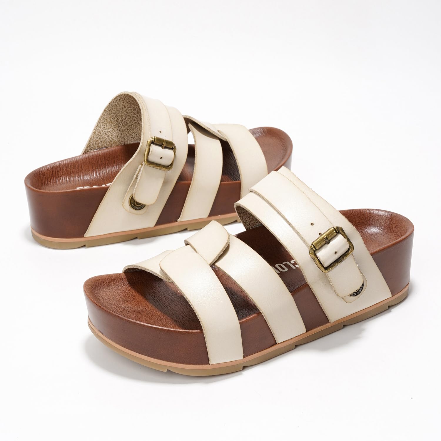 Project Cloud Proud Vegan Leather Platform Sandals in cream and brown, with buckle detail and memory foam sole.