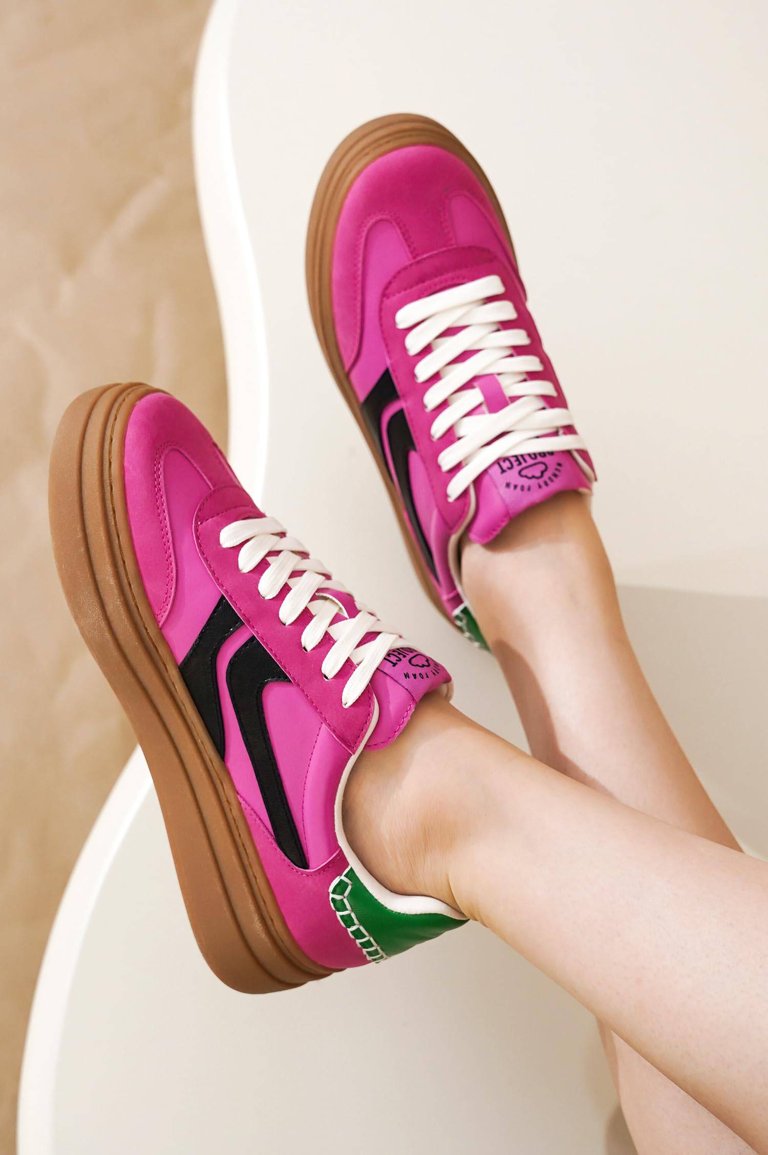 Pink Project Cloud Dodge platform sneakers, black accents, brown sole, women's fashion.