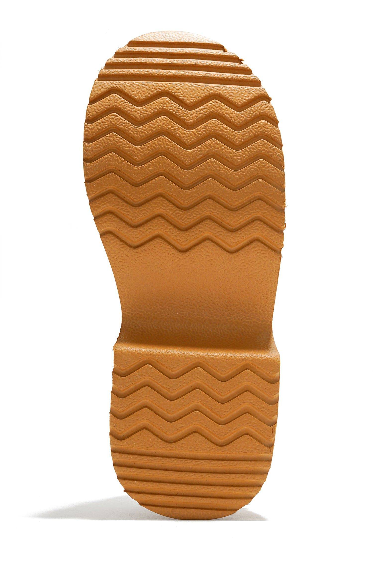 Project Cloud Johnna Mule non-slip sole detail in tan. Textured rubber outsole for secure grip and comfortable support.
