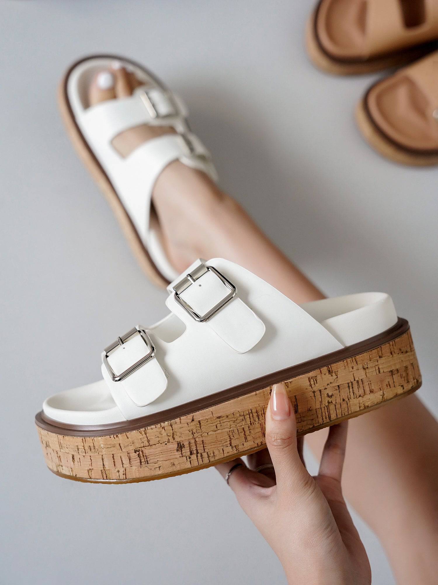 White vegan leather women's sandals with buckle detail, cork platform sole, Project Cloud, ProjectPlush memory foam.