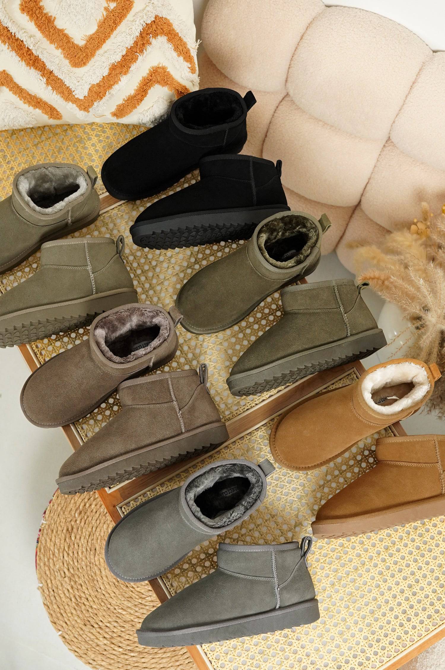 Hippy ankle boots collection in multiple colors: black, olive, brown, gray, and taupe, showcasing suede and faux fur lining