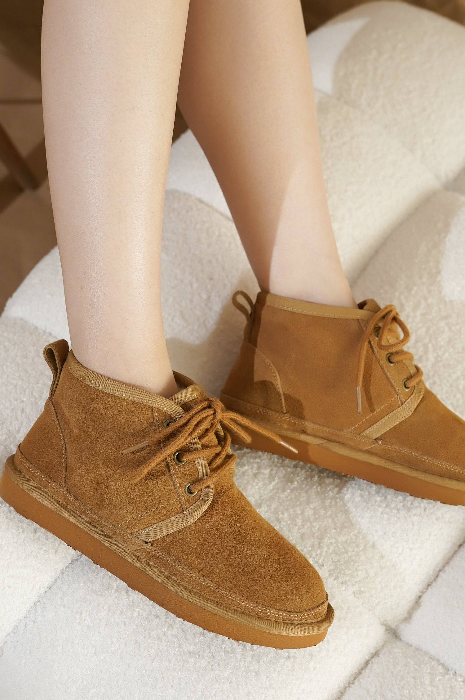 Project Cloud Julee women's suede ankle boots in brown. Featuring genuine suede, lace-up design, and non-slip sole.