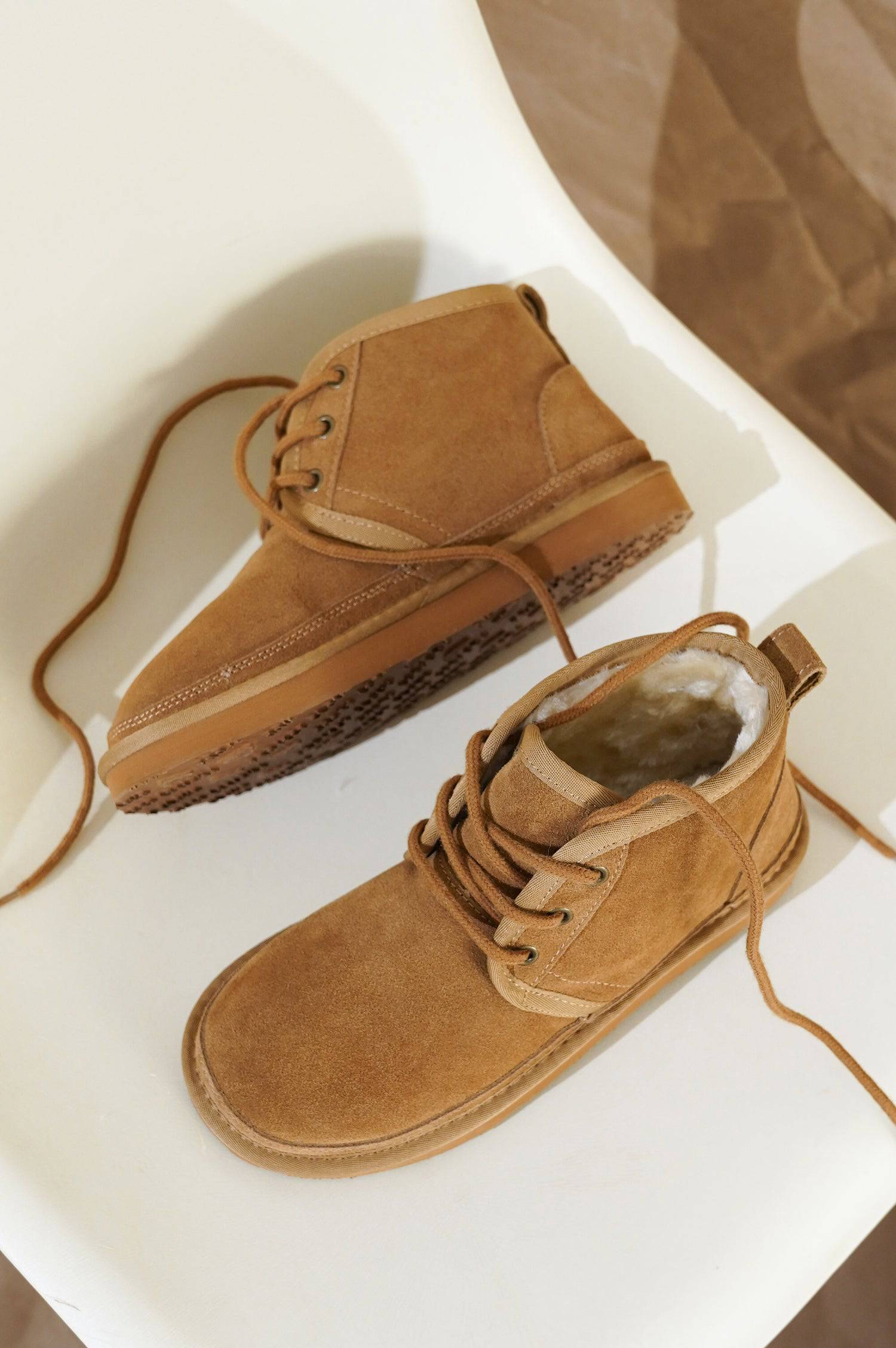 Project Cloud Julee women's brown suede ankle boots, featuring fur lining and lace-up design for winter comfort.