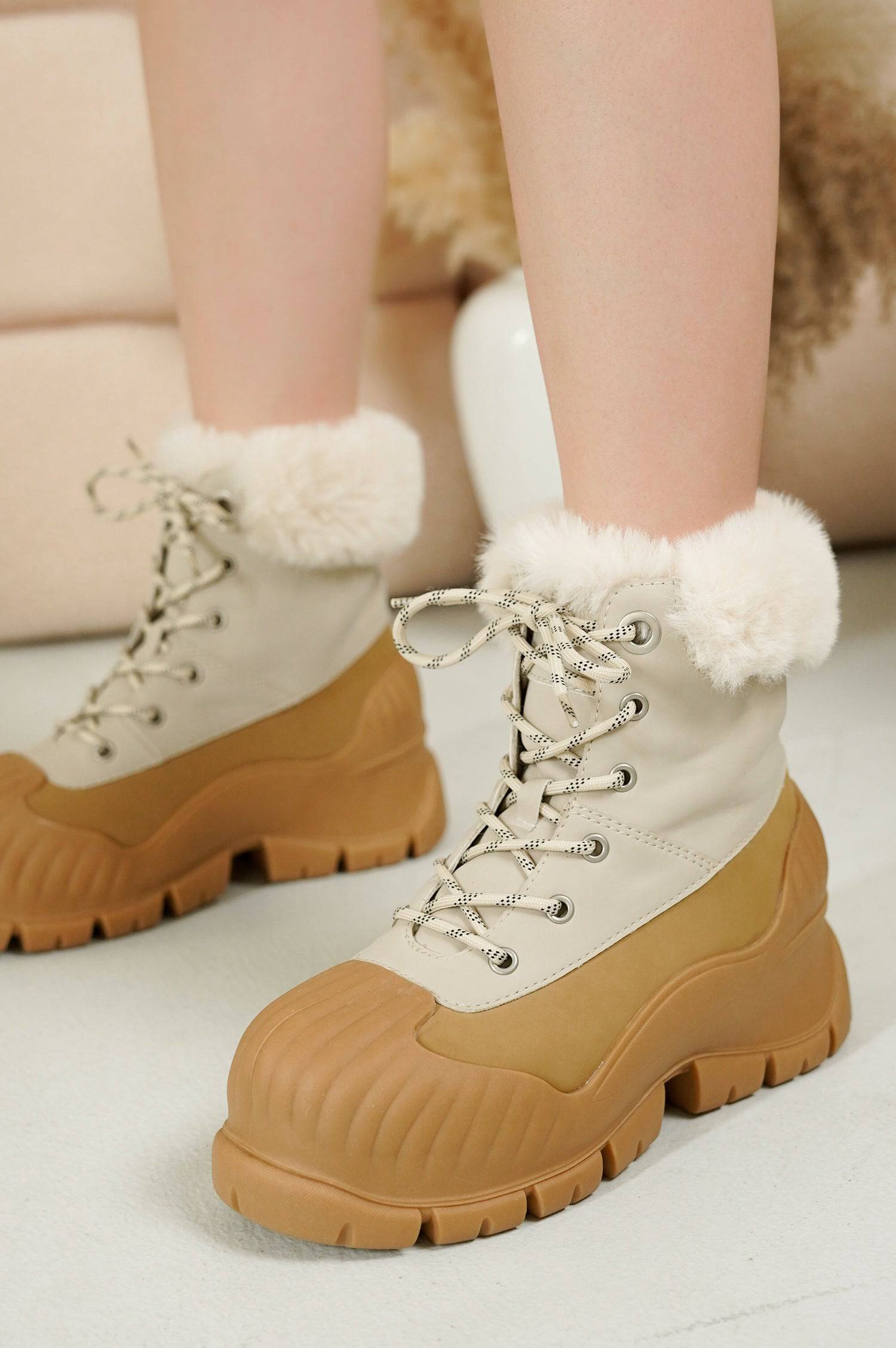 Project Cloud Lydia Winter Boots in beige and tan with faux fur trim, lace-up design, and waterproof construction.