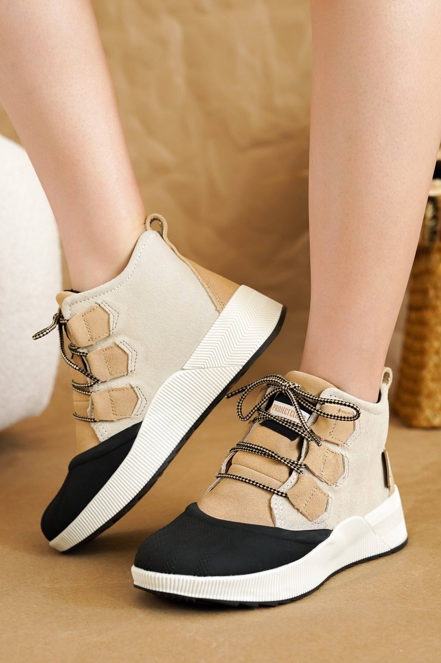 Project Cloud Rhianon women's waterproof snow boots, beige suede upper, black toe, non-slip outsole. Waterproof winter shoes.