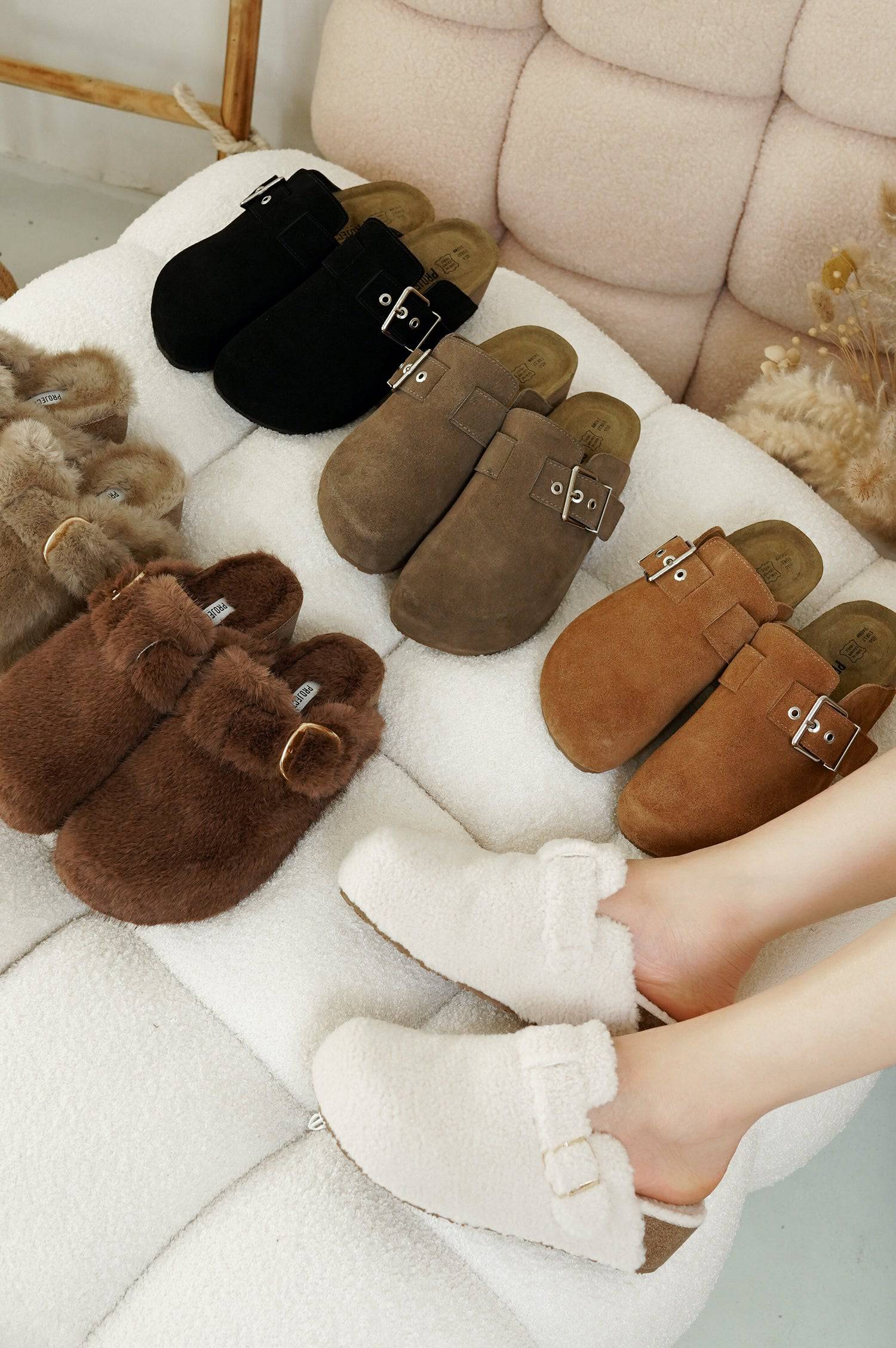 Project Cloud Rhona Clogs in multiple colors: black suede, brown fur, cream shearling, with adjustable buckles.