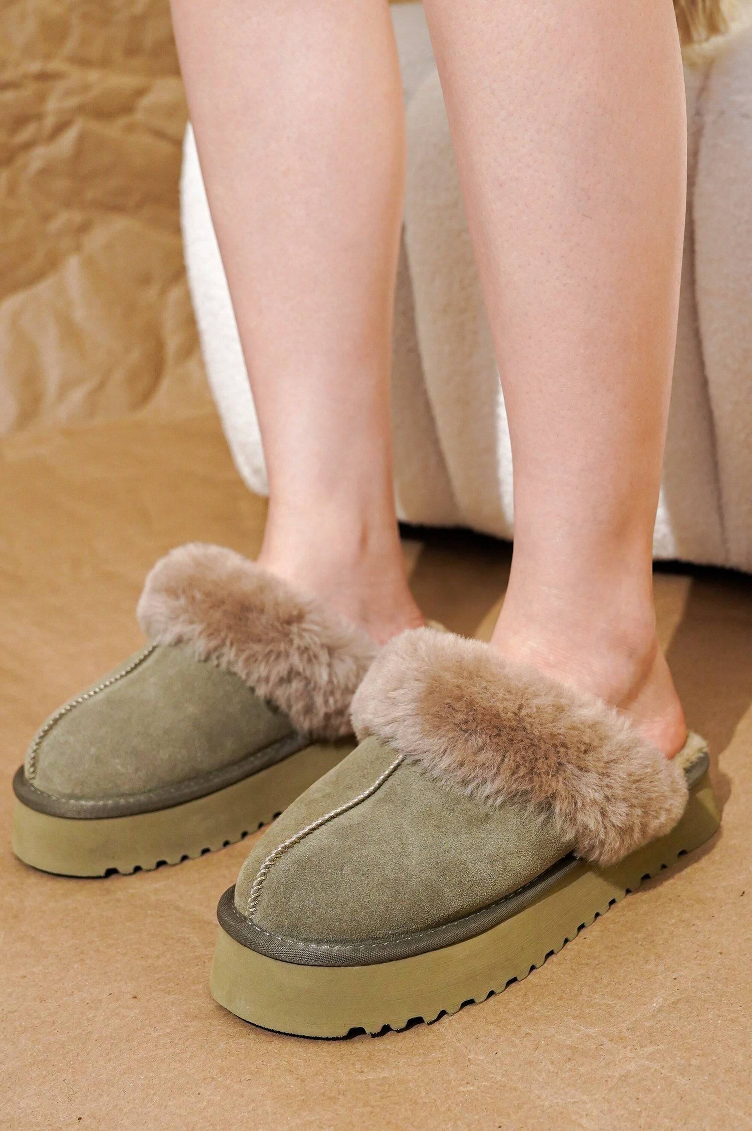 Olive green suede Viki platform slippers with fur trim, memory foam, and non-slip sole.