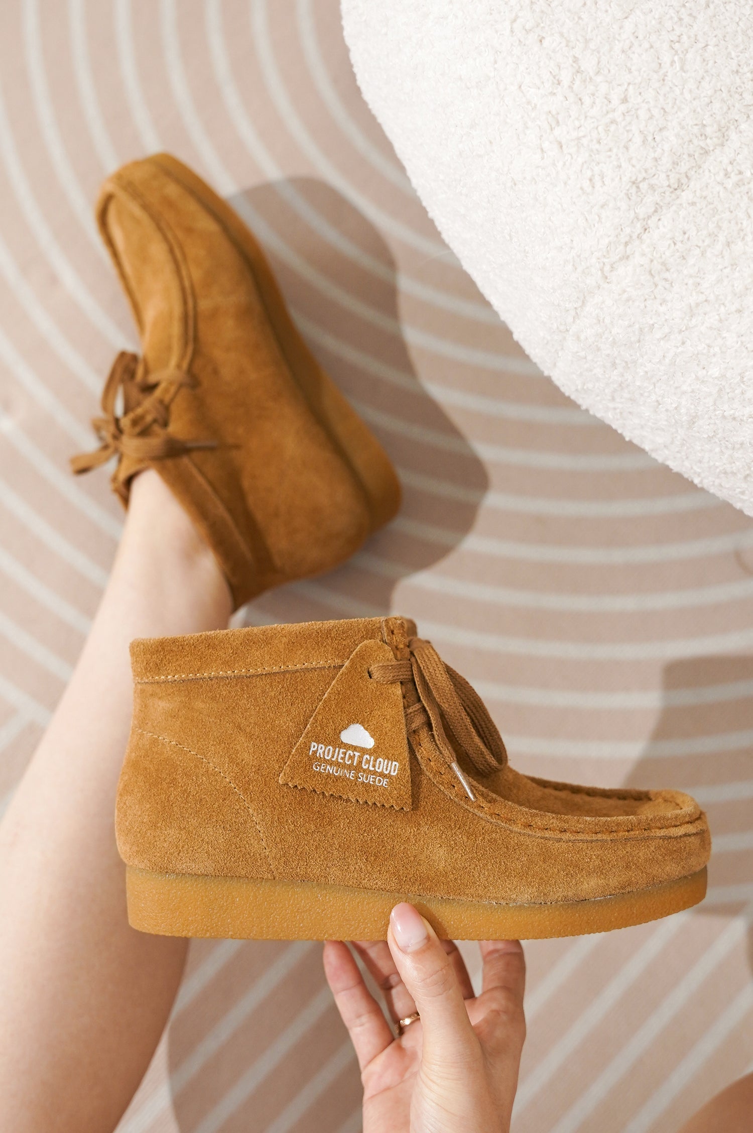 Project Cloud sand suede Wally Boot on woman's foot. Genuine suede ankle boot with memory foam.