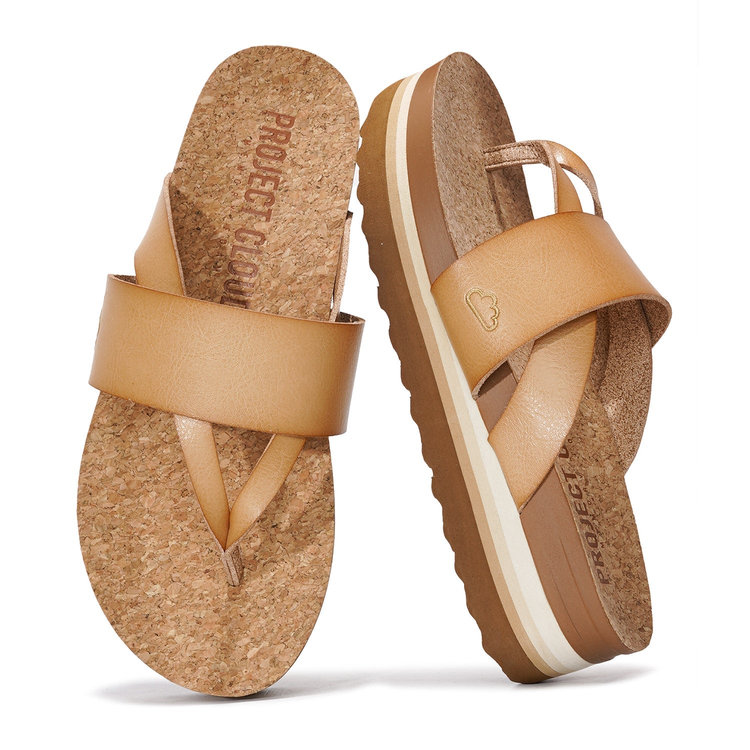 Project Cloud Raft vegan leather wedge sandals in tan with cork footbed, anti-slip sole and Project Cloud logo.