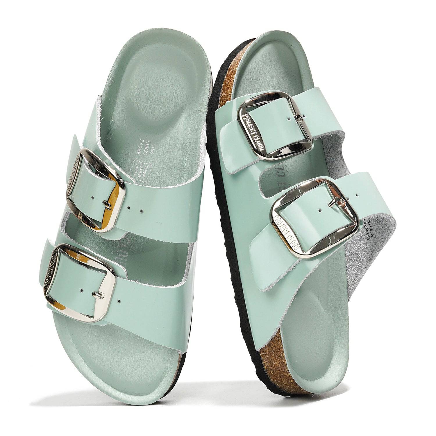 Mint green Project Cloud Santorini leather sandals with buckle straps.