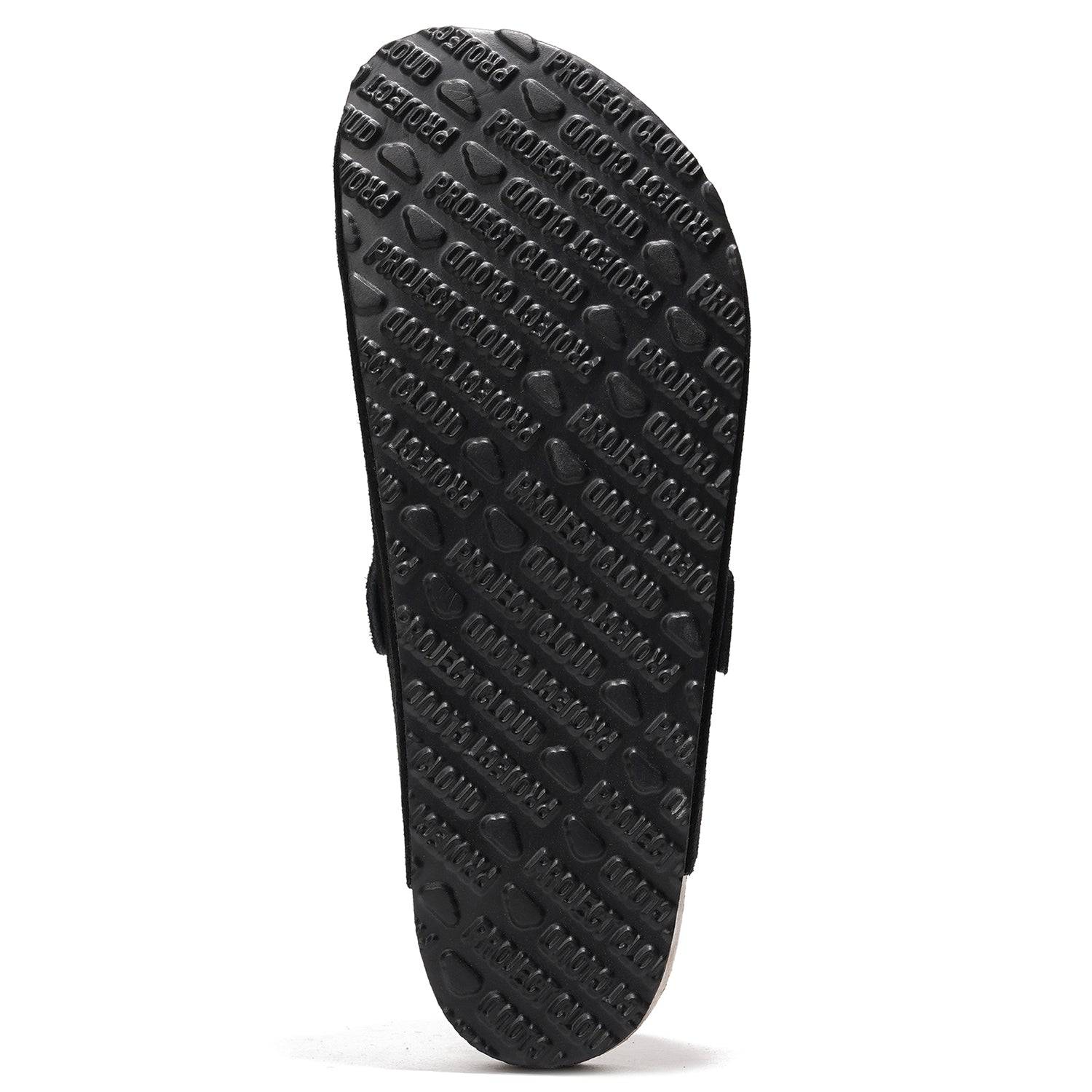Project Cloud men's slipper sole with textured rubber and branding, promoting comfort and non-slip design for everyday wear.