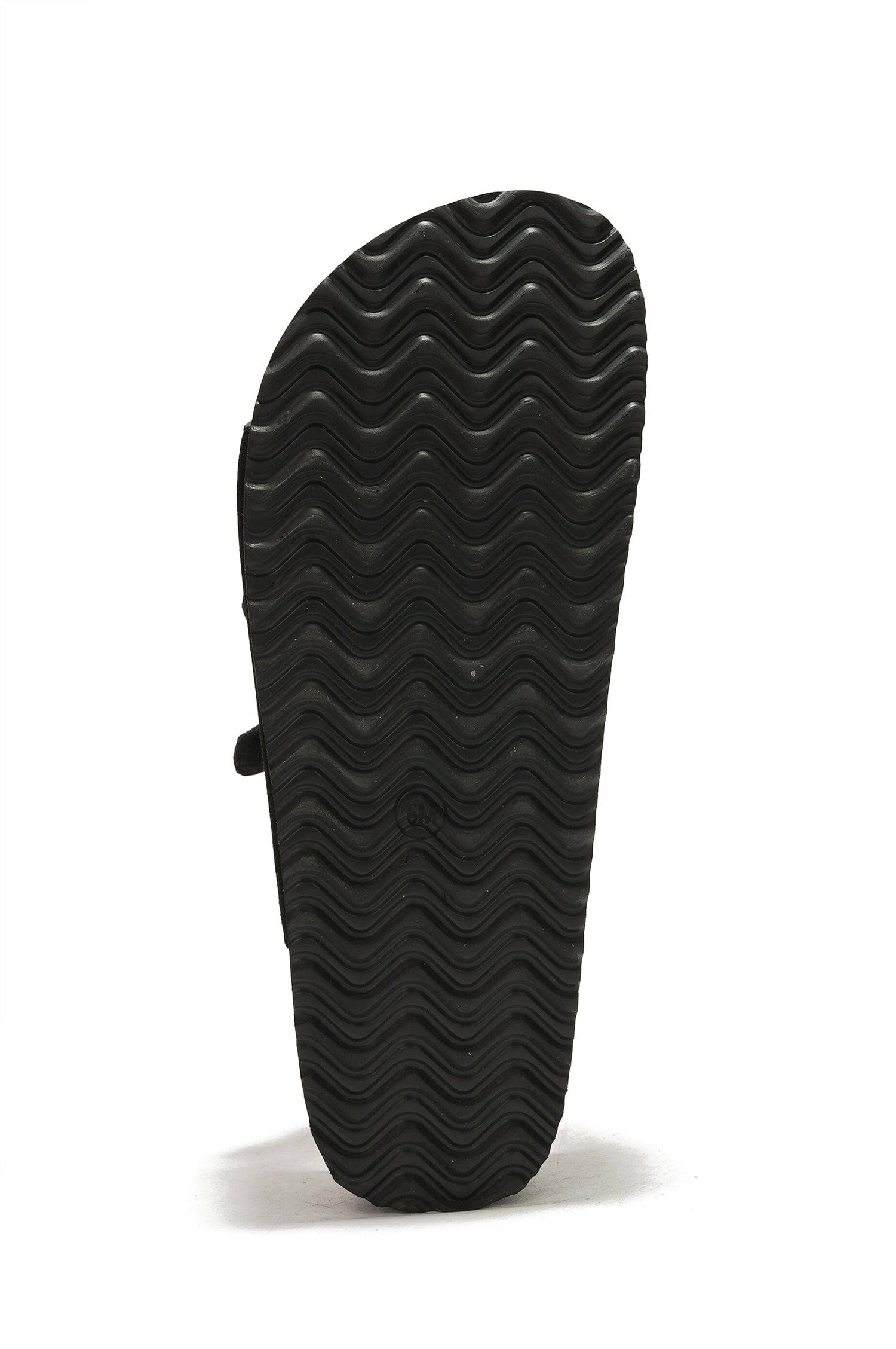 Black non-slip sole of Project Cloud Dyan platform sandals, showing wave-patterned tread for grip and durability.