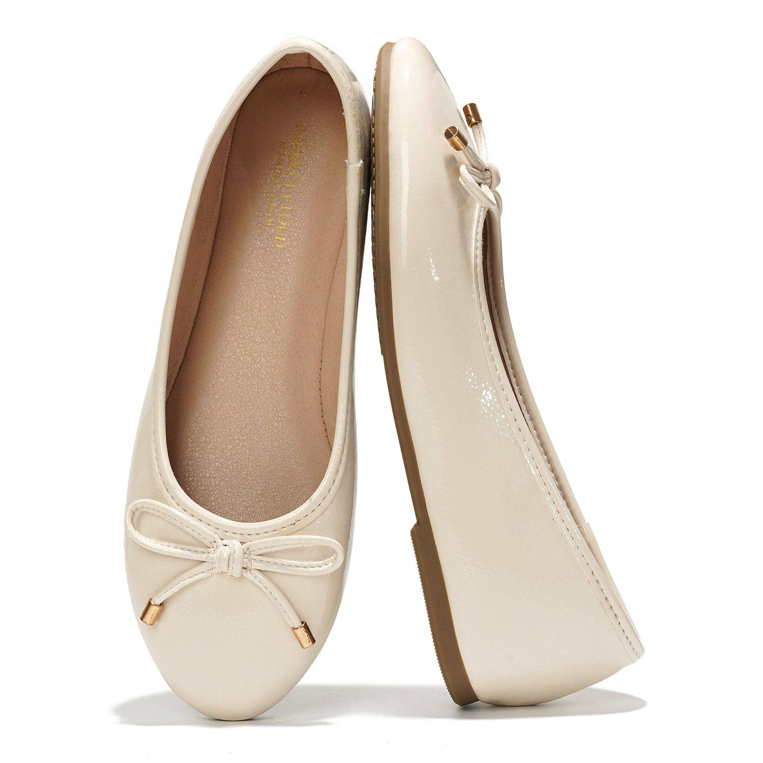 Project Cloud ballet flats in cream vegan leather with bow detail and gold accents, designed for all-day comfort and style.