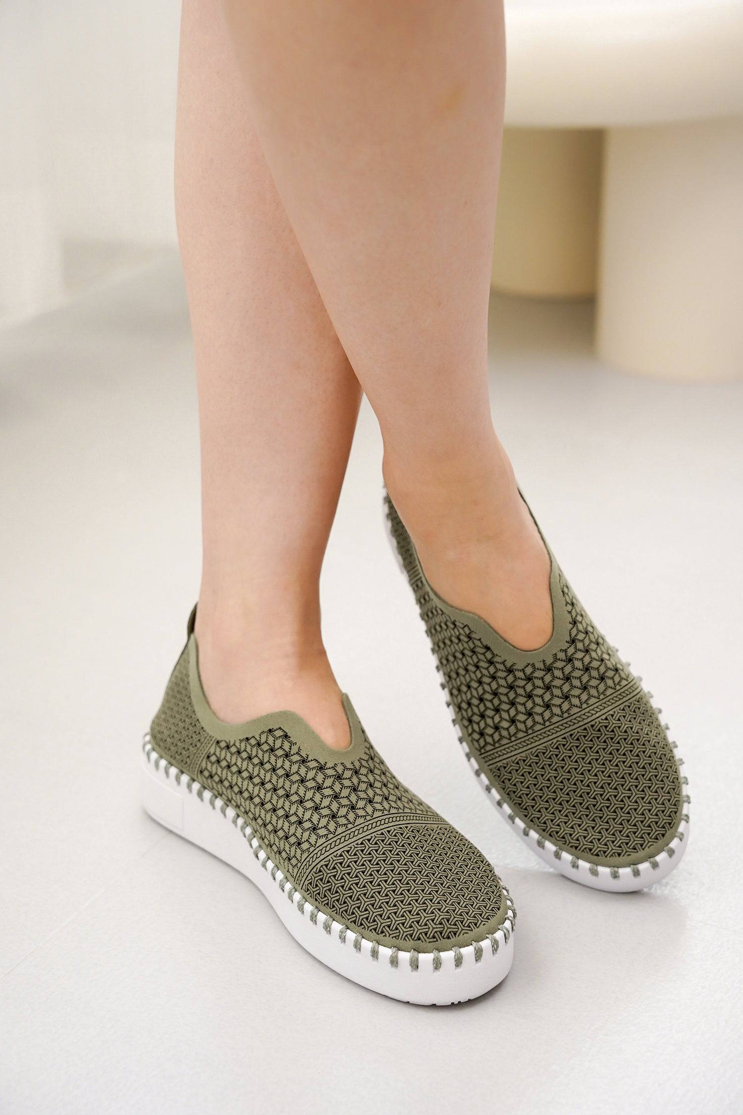 Aster Women's Olive Green Sneakers, featuring breathable knit upper and white sole, perfect for sockless wear.