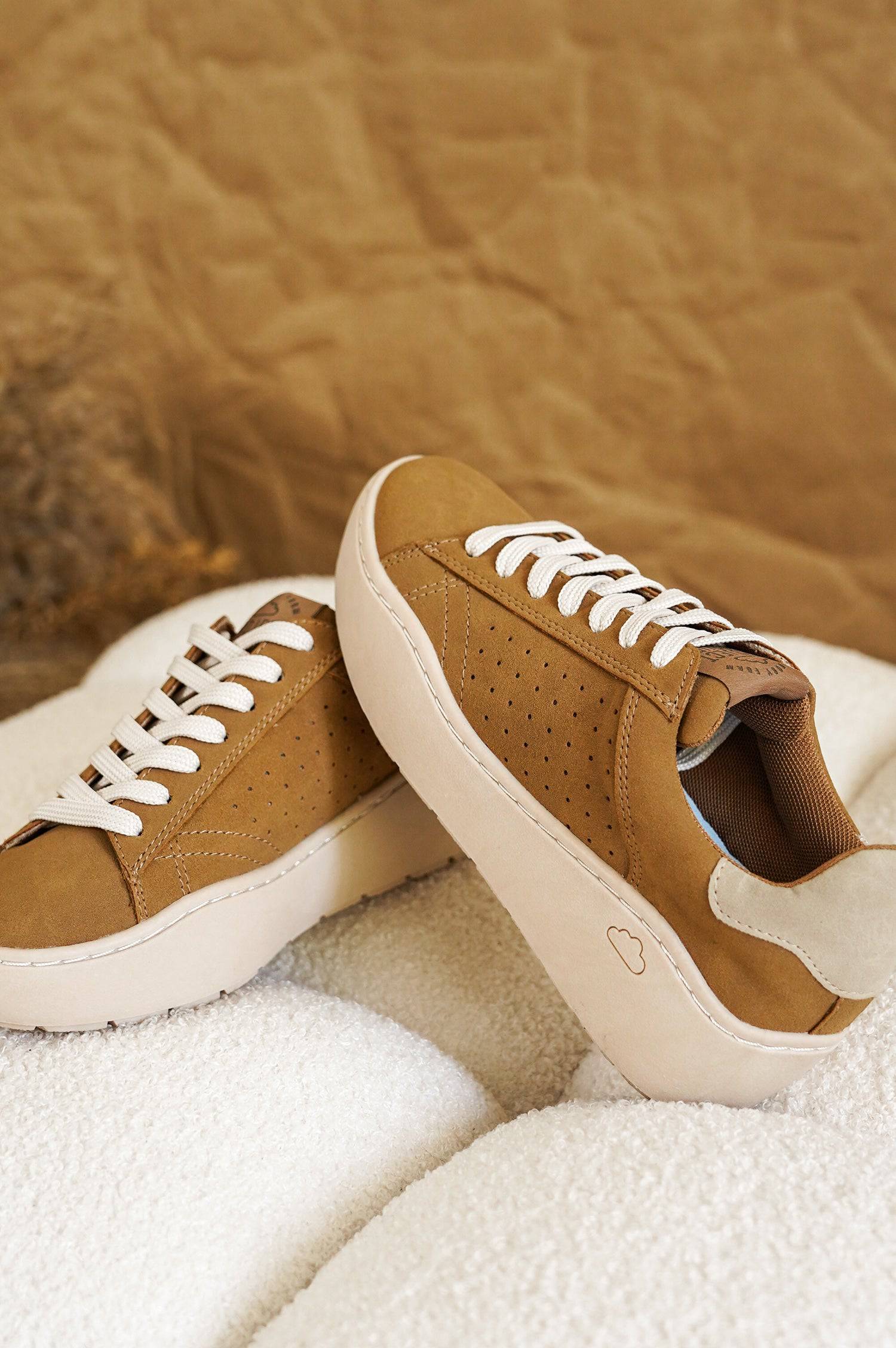 Bossy platform sneakers: brown suede, white laces, beige sole. Project Cloud footwear for comfort and style.