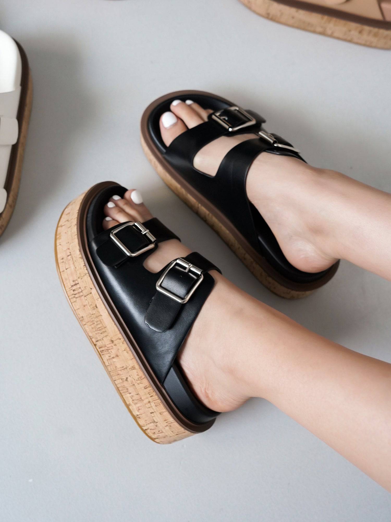 Black vegan leather wedge sandals with buckle detail and cork platform sole, Project Cloud