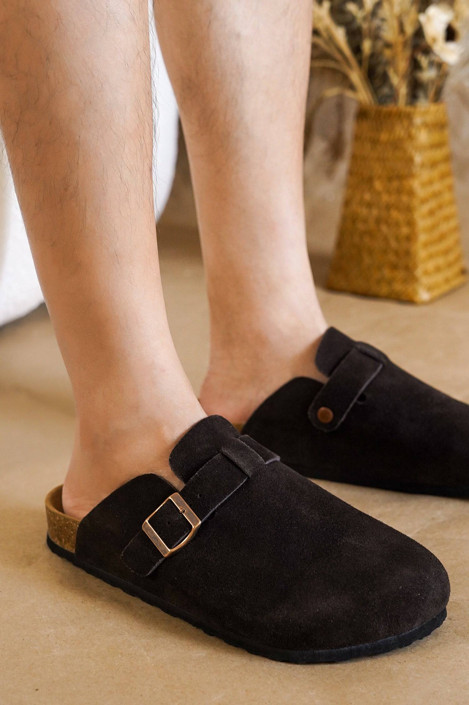 Mens Brooklyn clogs in dark brown suede with buckle detail, cork footbed, perfect for comfort and style.