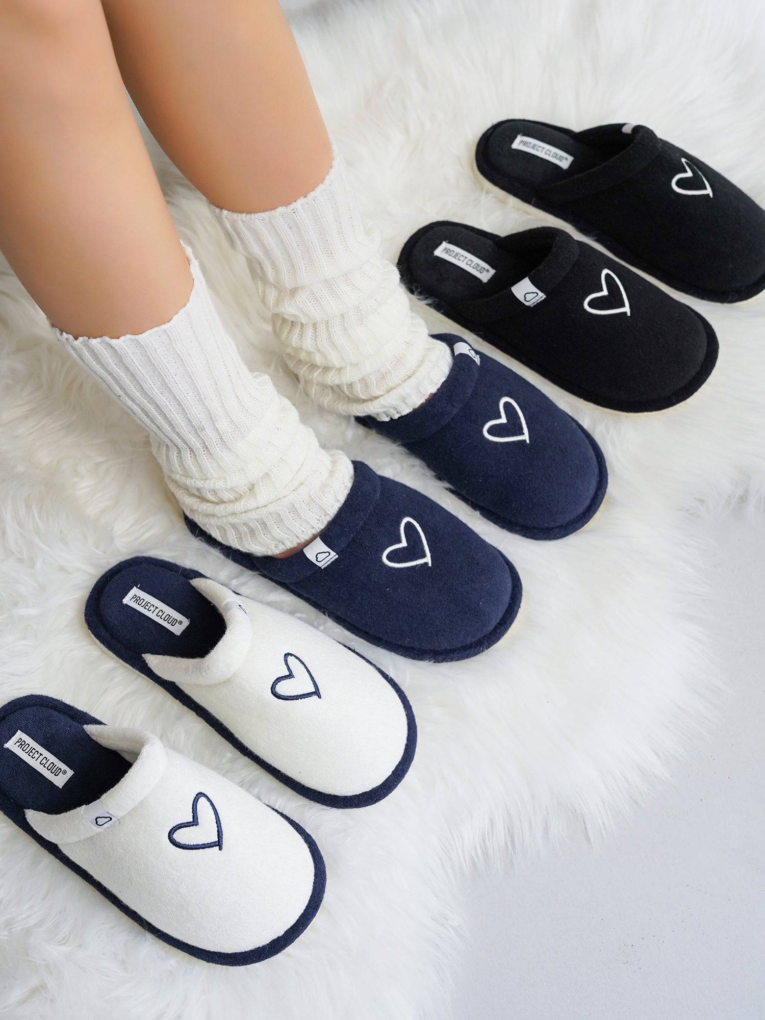 Project Cloud Casa Women's Memory Foam Slippers with heart detail in black, navy, and white.