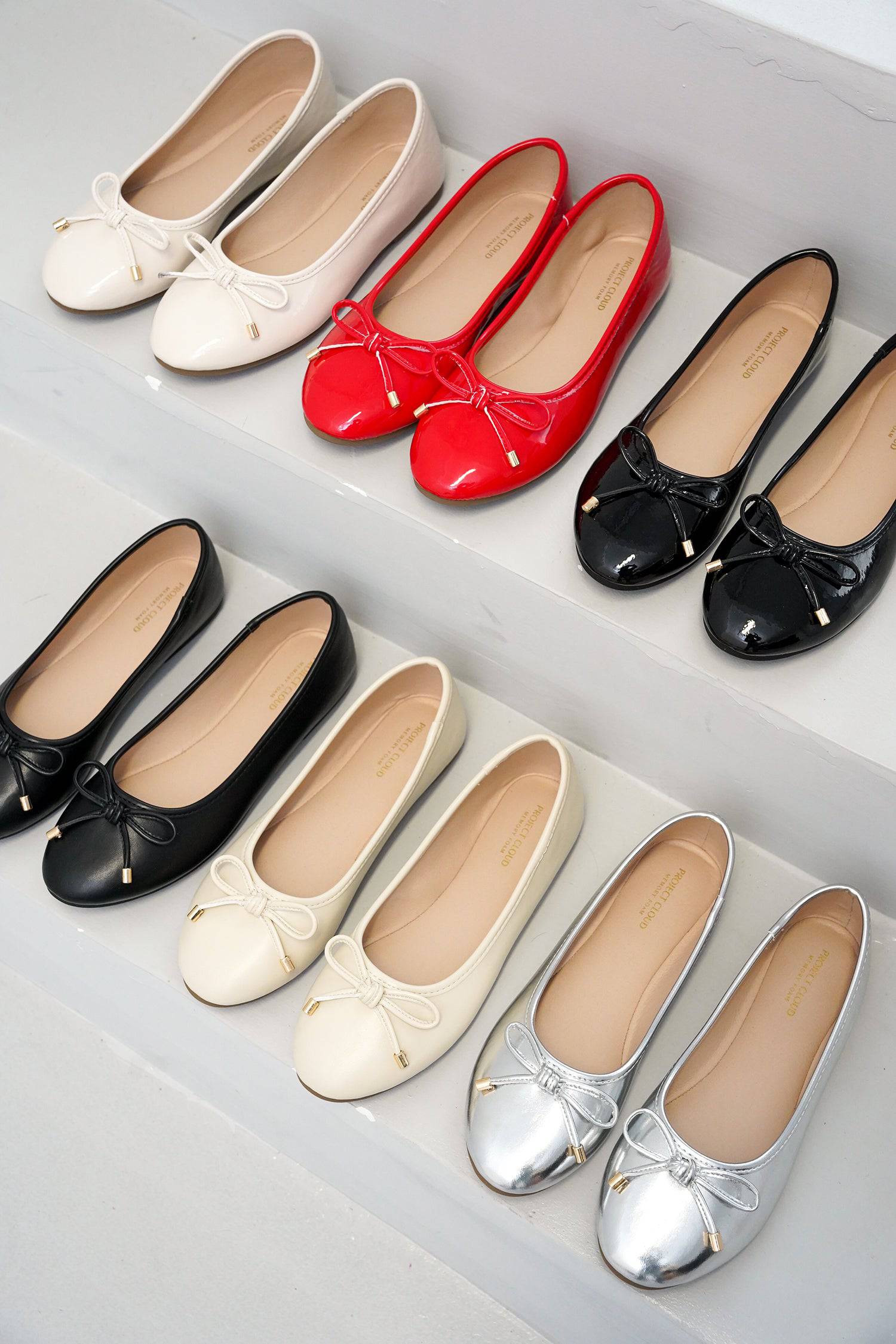 Project Cloud ballet flats in various colors: cream, red, black, and silver, bow detail, ProjectPlush insole.