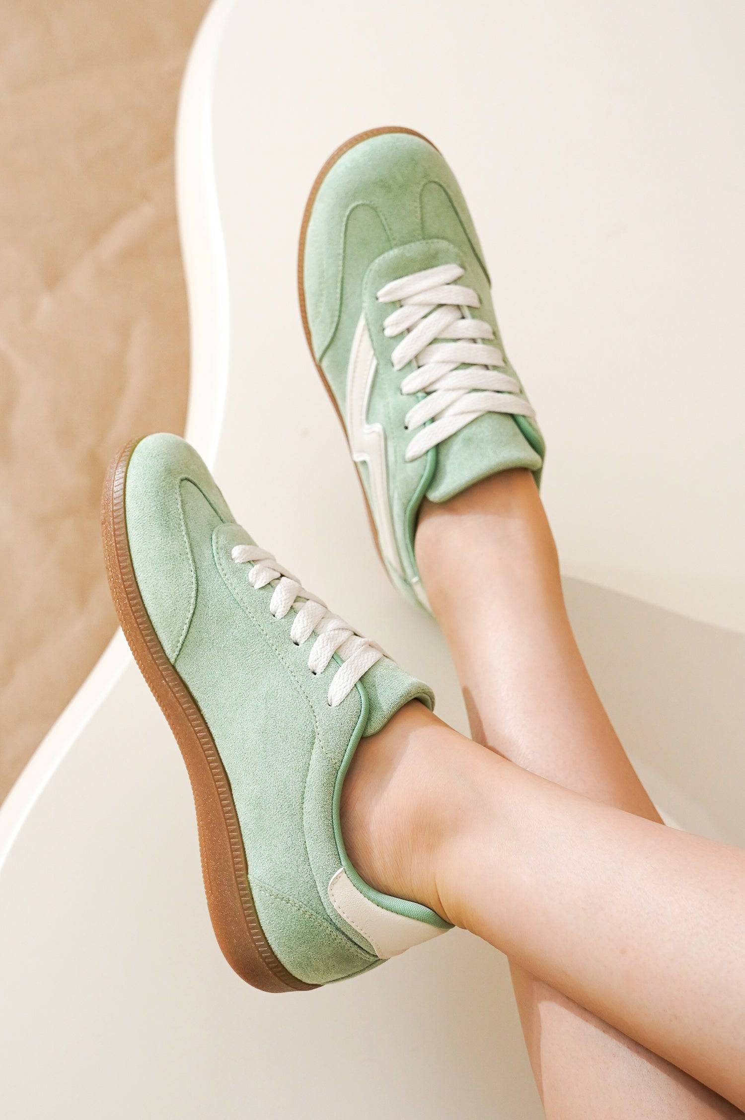 Mint green suede women's lace-up sneakers. Project Cloud Irita women's shoes with brown sole.