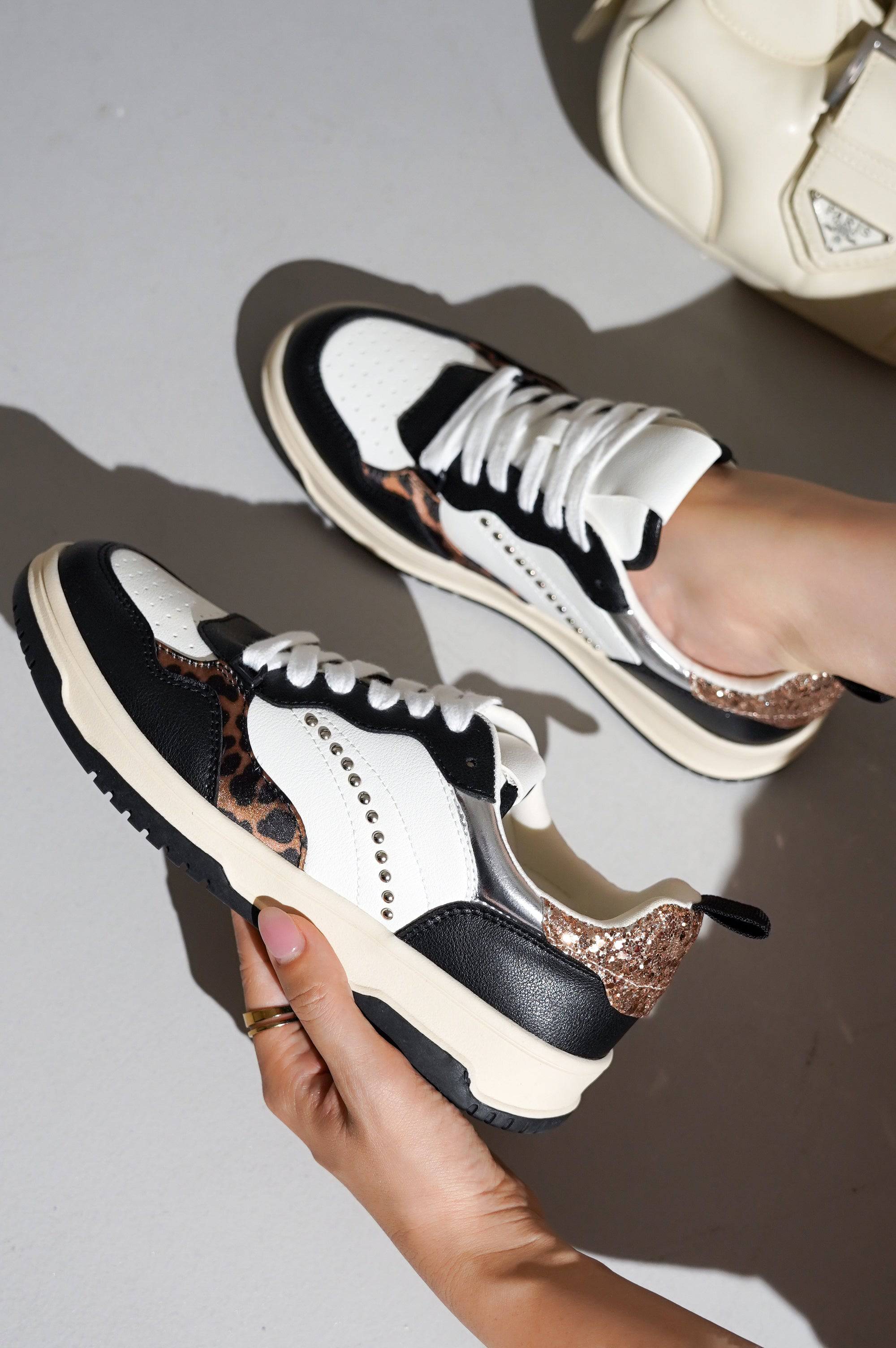Women's Kiki sneakers with leopard print details, vegan leather. Stylish, comfortable, memory foam, glitter heel.