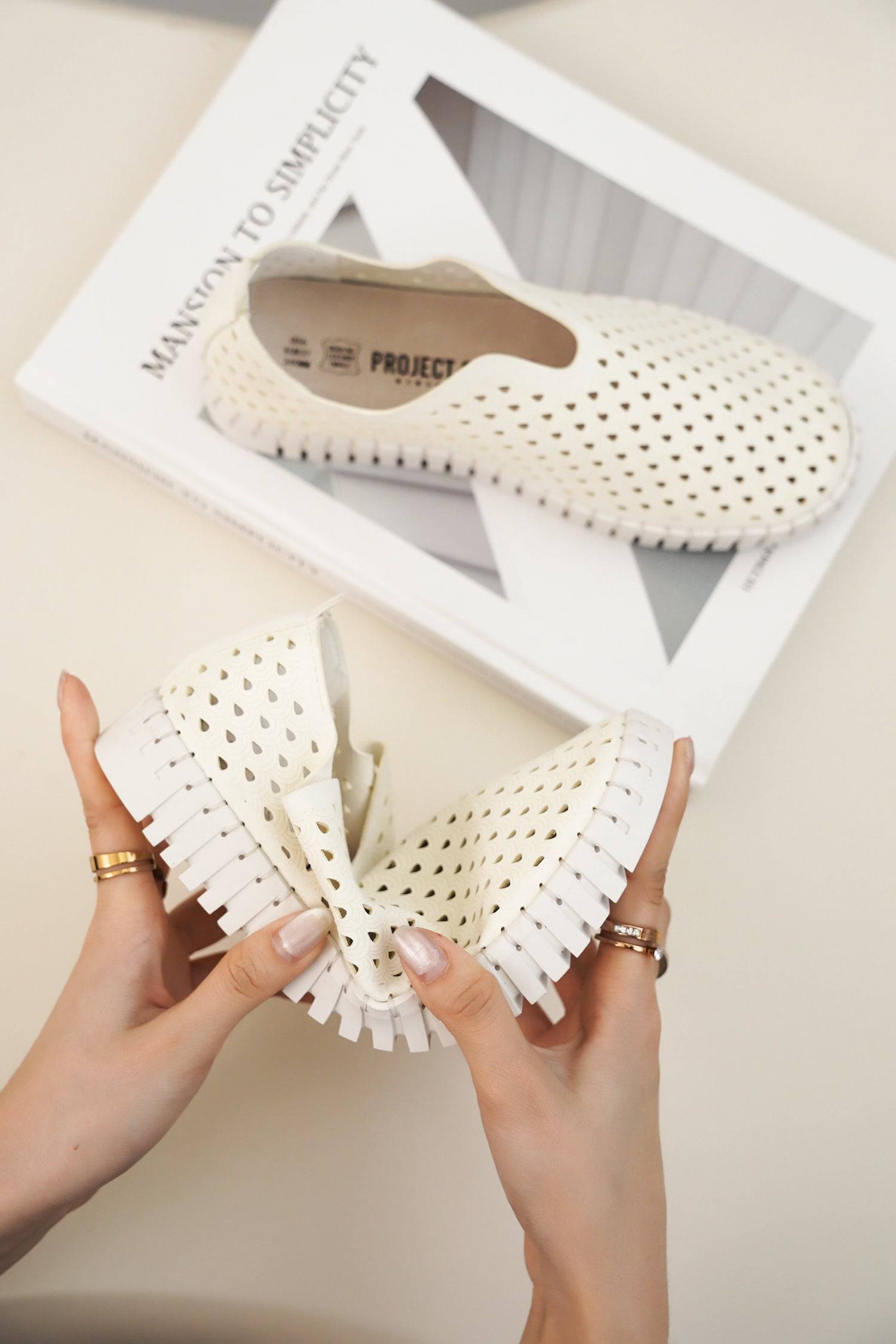 Lightweight off-white perforated Lily loafers. Women's comfortable slip-on shoes by Project Cloud.