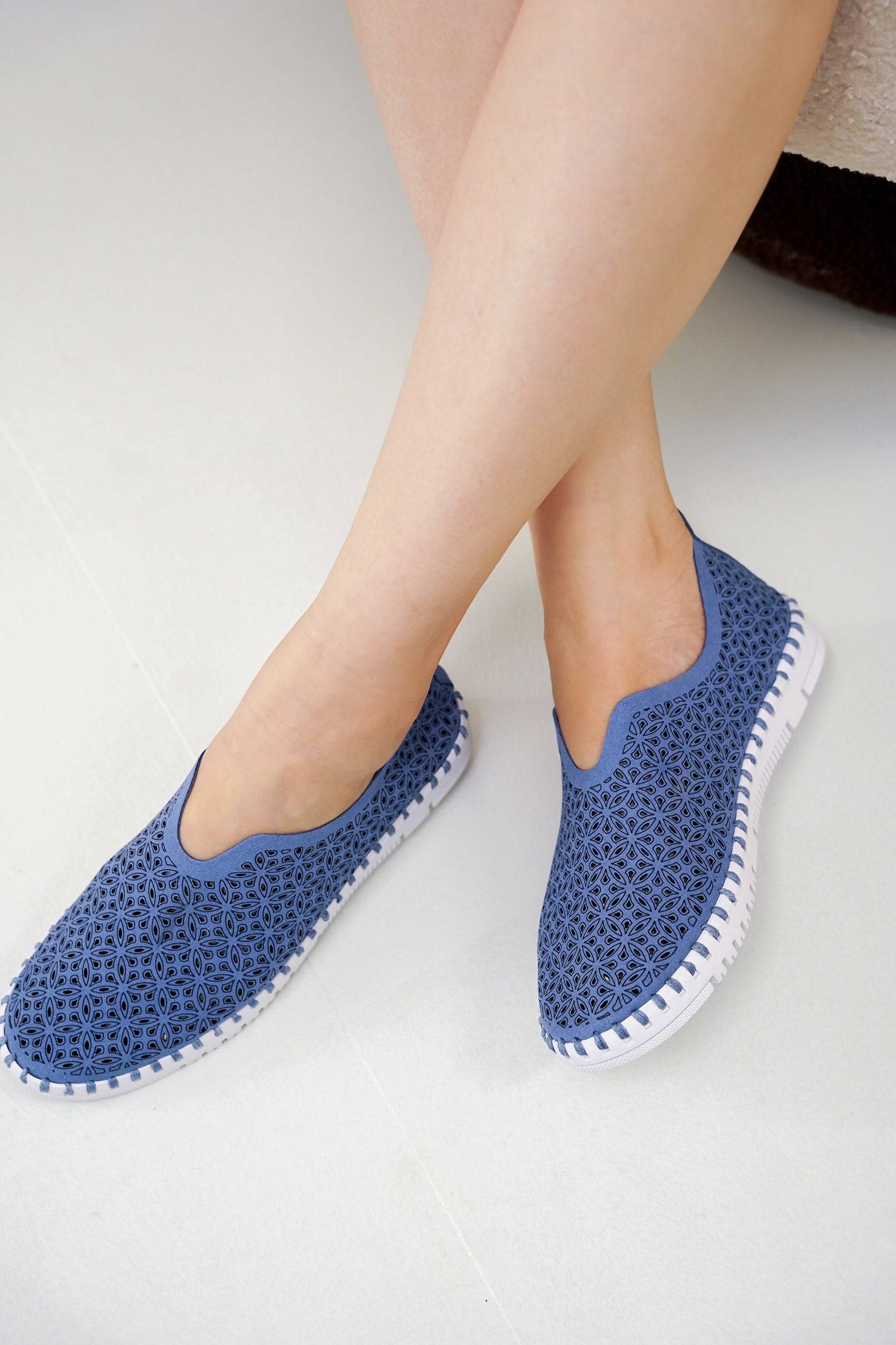 Blue perforated slip-on sneakers for women, white sole. Lightweight, breathable, Project Cloud.