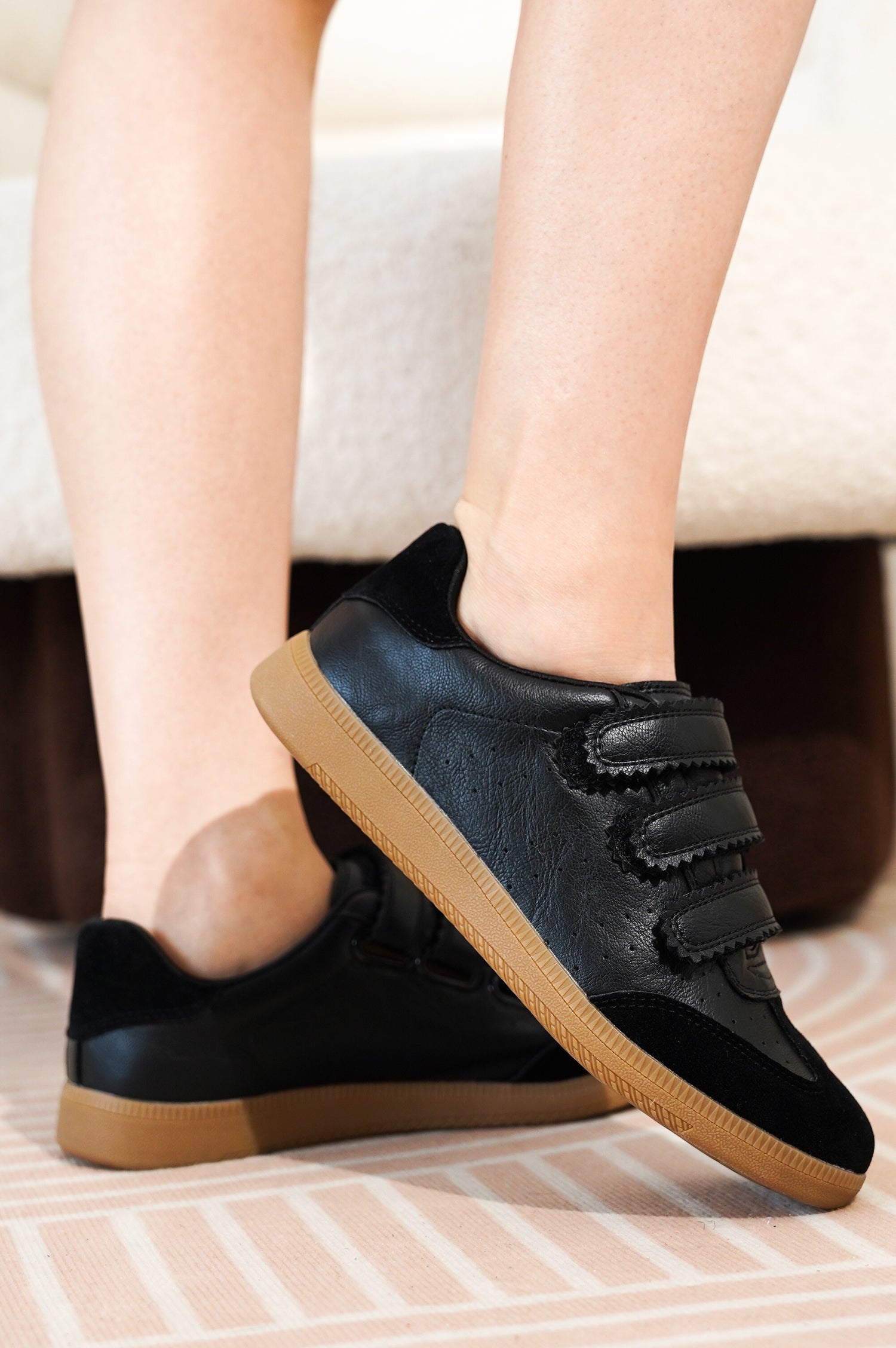 Project Cloud Ysabelle black vegan leather sneakers with velcro straps and tan sole, showcasing women's footwear.
