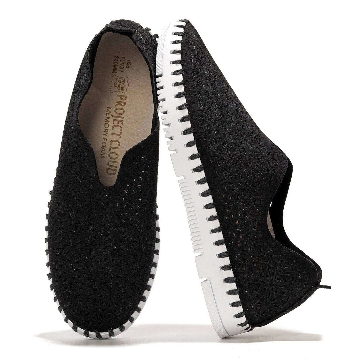 Black slip-on sneakers for women. Featuring Project Cloud memory foam, breathable design with a white sole.