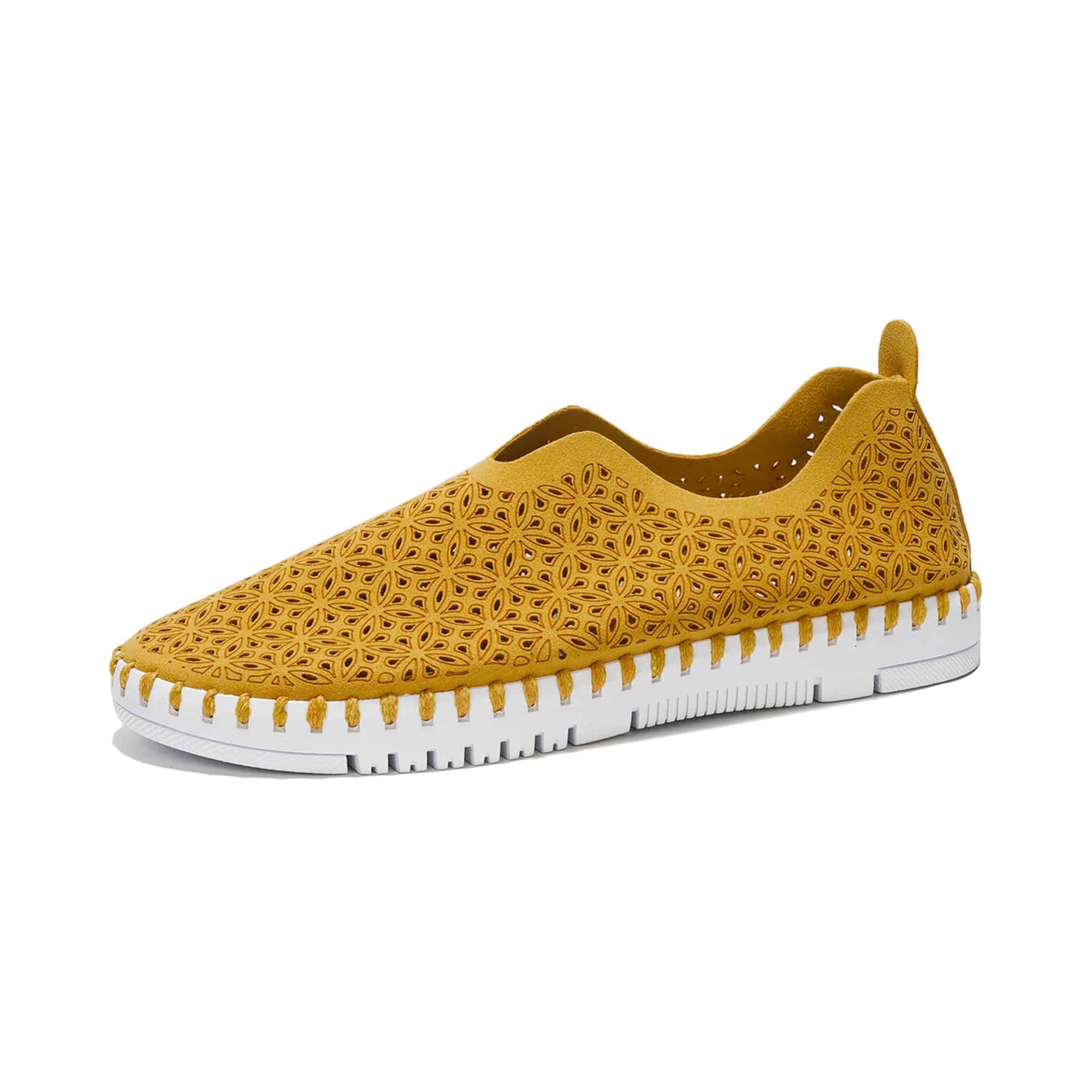 Mustard yellow laser-cut slip-on sneakers for women with a white sole, designed for comfort and style.