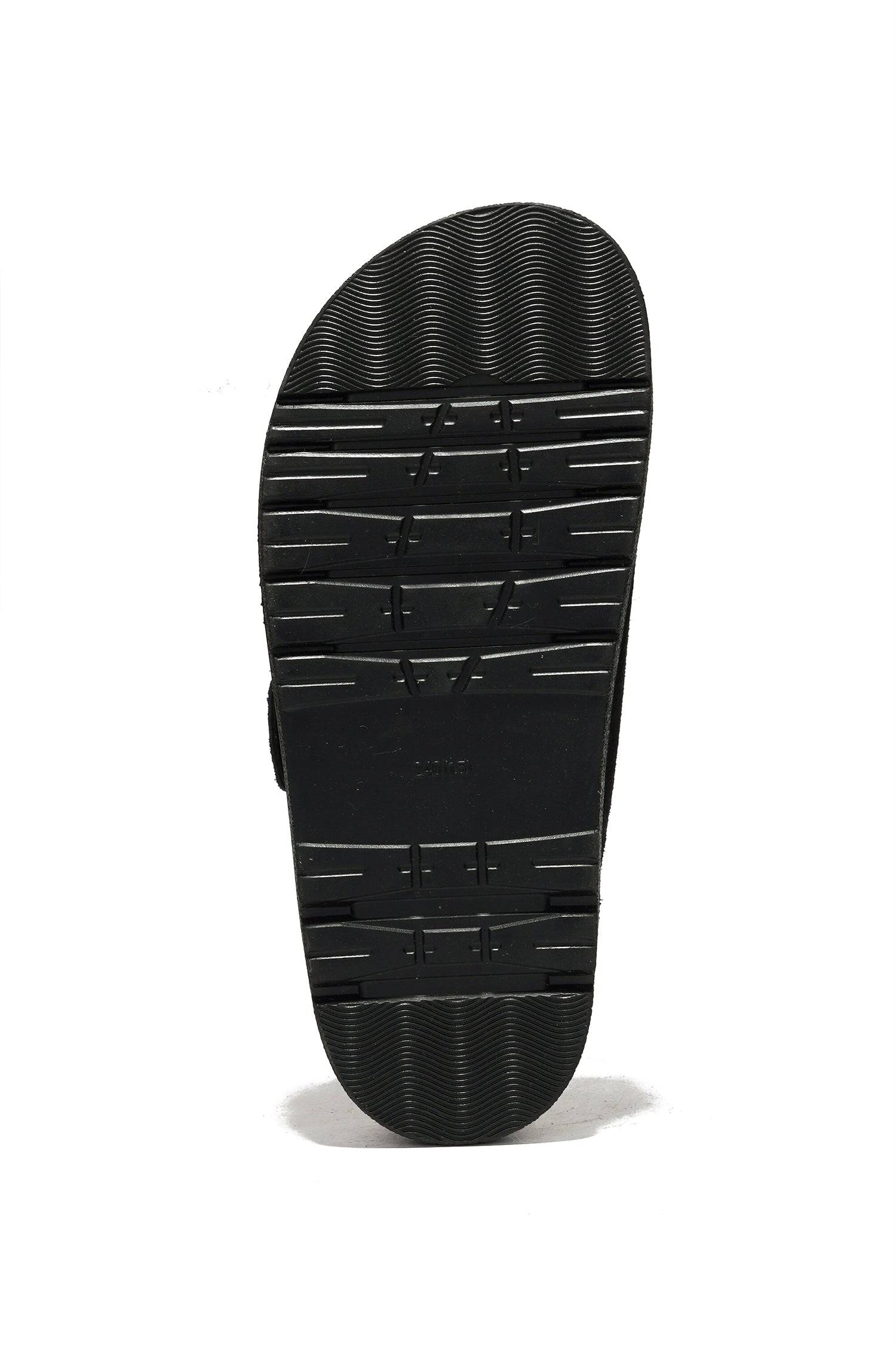 Black leather sandal sole. Non-slip rubber outsole of the Sharl women's platform sandals.
