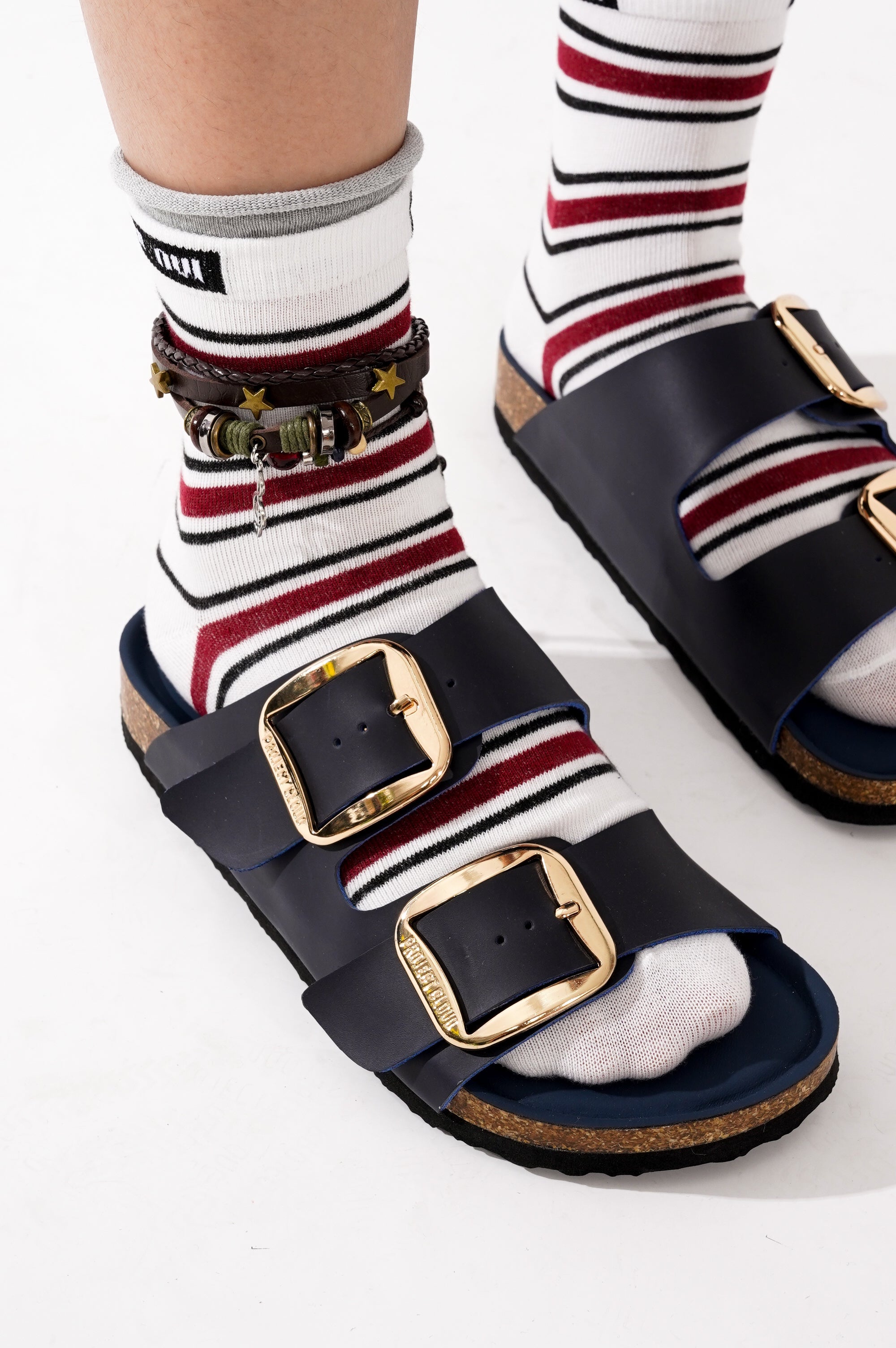 Navy blue leather Santorini sandals with gold buckles and Project Cloud logo, comfortable flat sandals